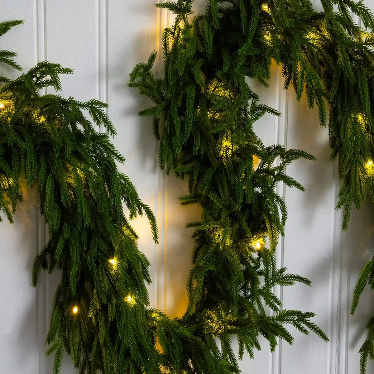 9' Pre-Lit Artificial Real Touch Norfolk Island Pine Garland with 50 Warm White LED Lights and Natural Look
