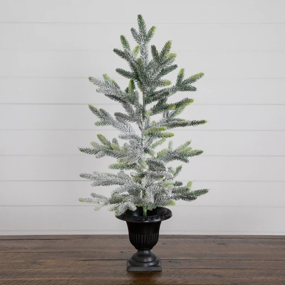 2' Artificial Frosted Christmas Tree in Black Decorative Urn
