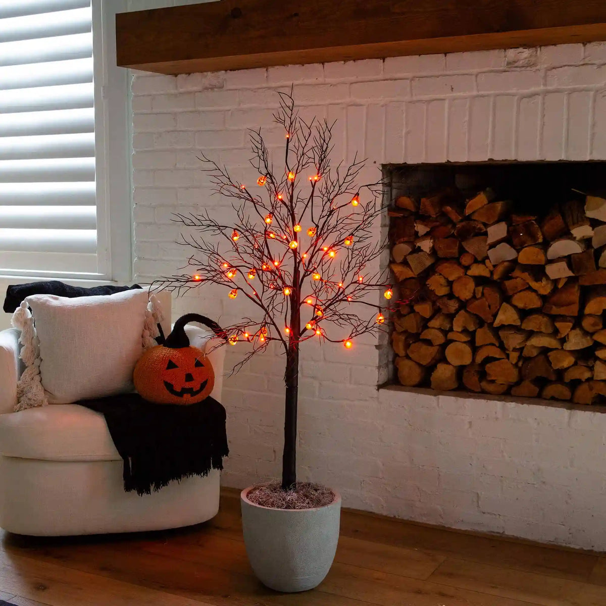 4' Pre-Lit Artificial Halloween Black Twig Tree with 24 Orange LED Pumpkin Shaped Lights