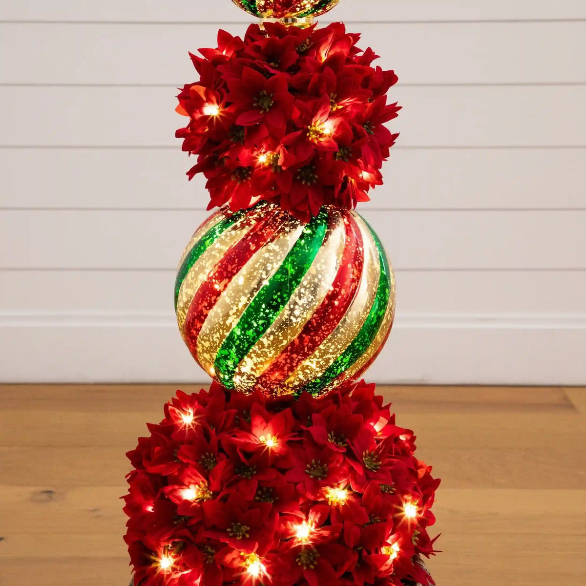 3’ Pre-Lit Artificial Christmas Poinsettia Topiary Tree with Finial Ornament and 70 LED Lights in Decorative Urn