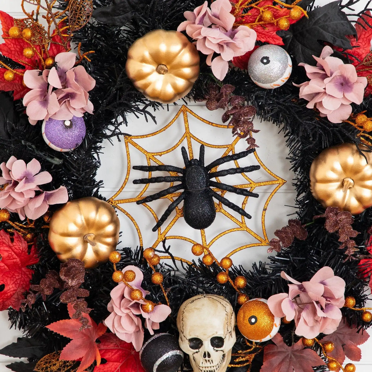 24” Artificial Halloween Wreath with Skulls, Spiders and Pumpkins